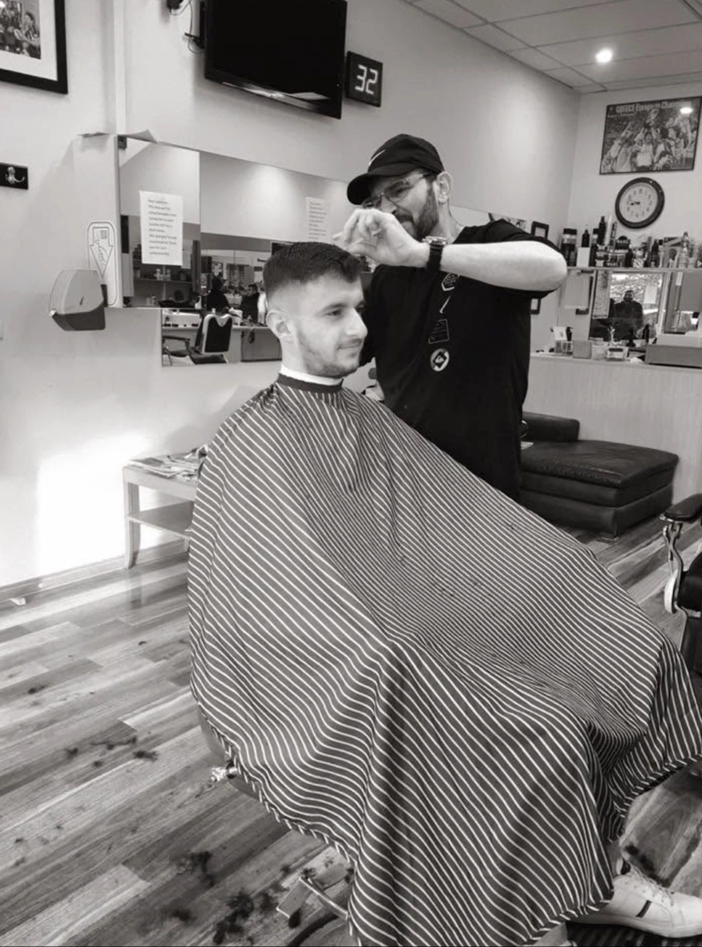 Barber at work in the chair