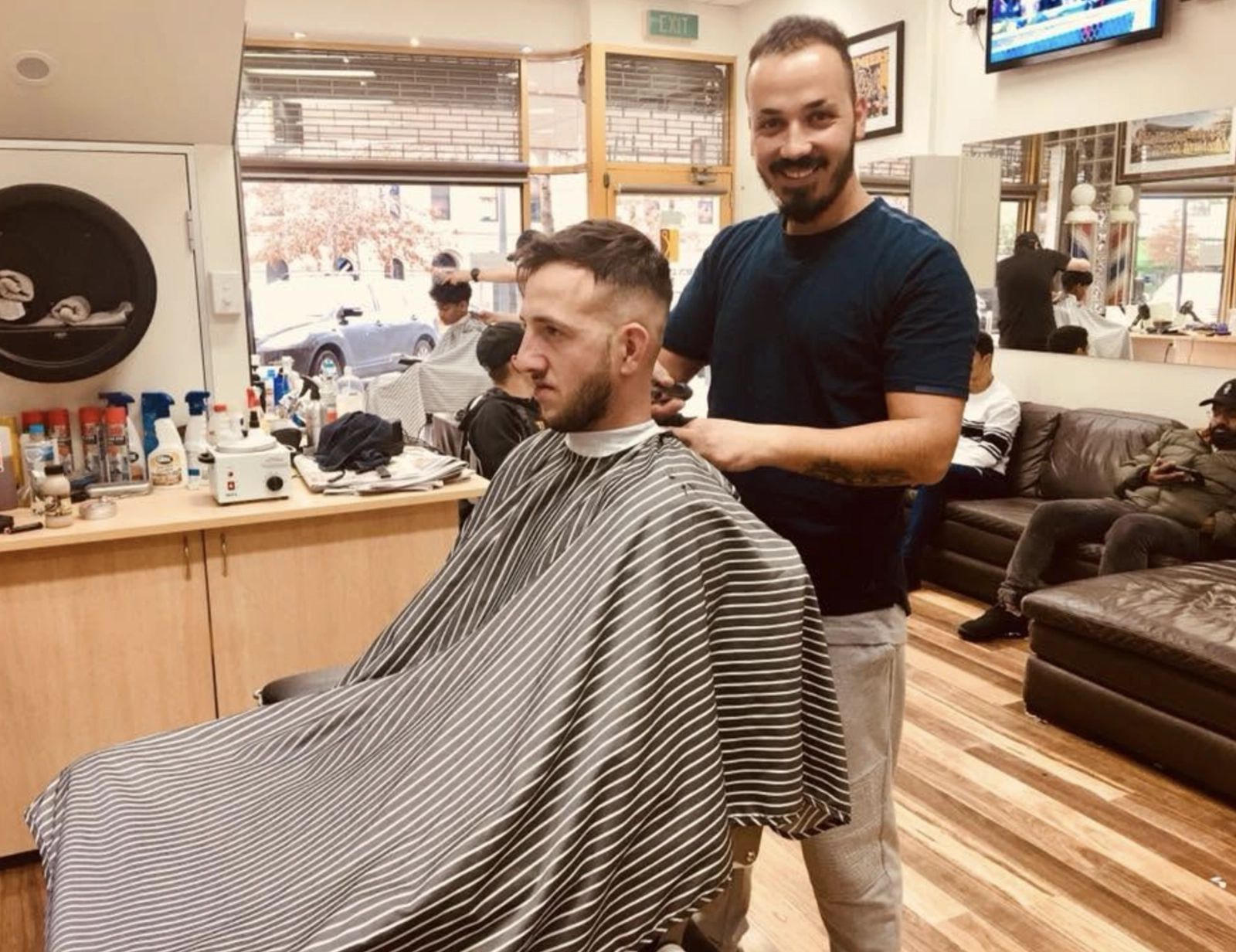 Barber at work inside Men In Style